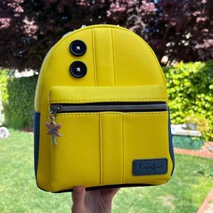 HTF Coraline yellow coat Loungefly